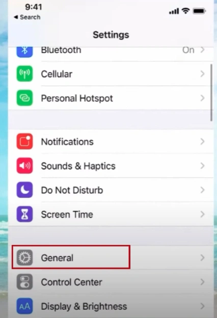 then scroll down and tap on General